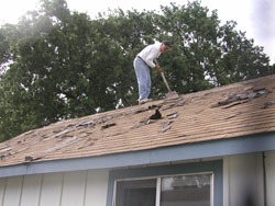 Removing old roof shingles
