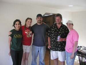 Speaker Roya Javadpour, members of the student team, and the homeowner