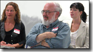 Members of the audience watch the Webcast